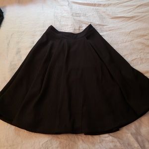 Guess black knee length pleated skirt